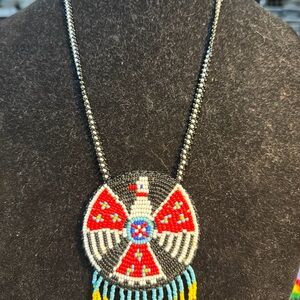 Handcrafted Beaded Necklace with Red and Blue Accents